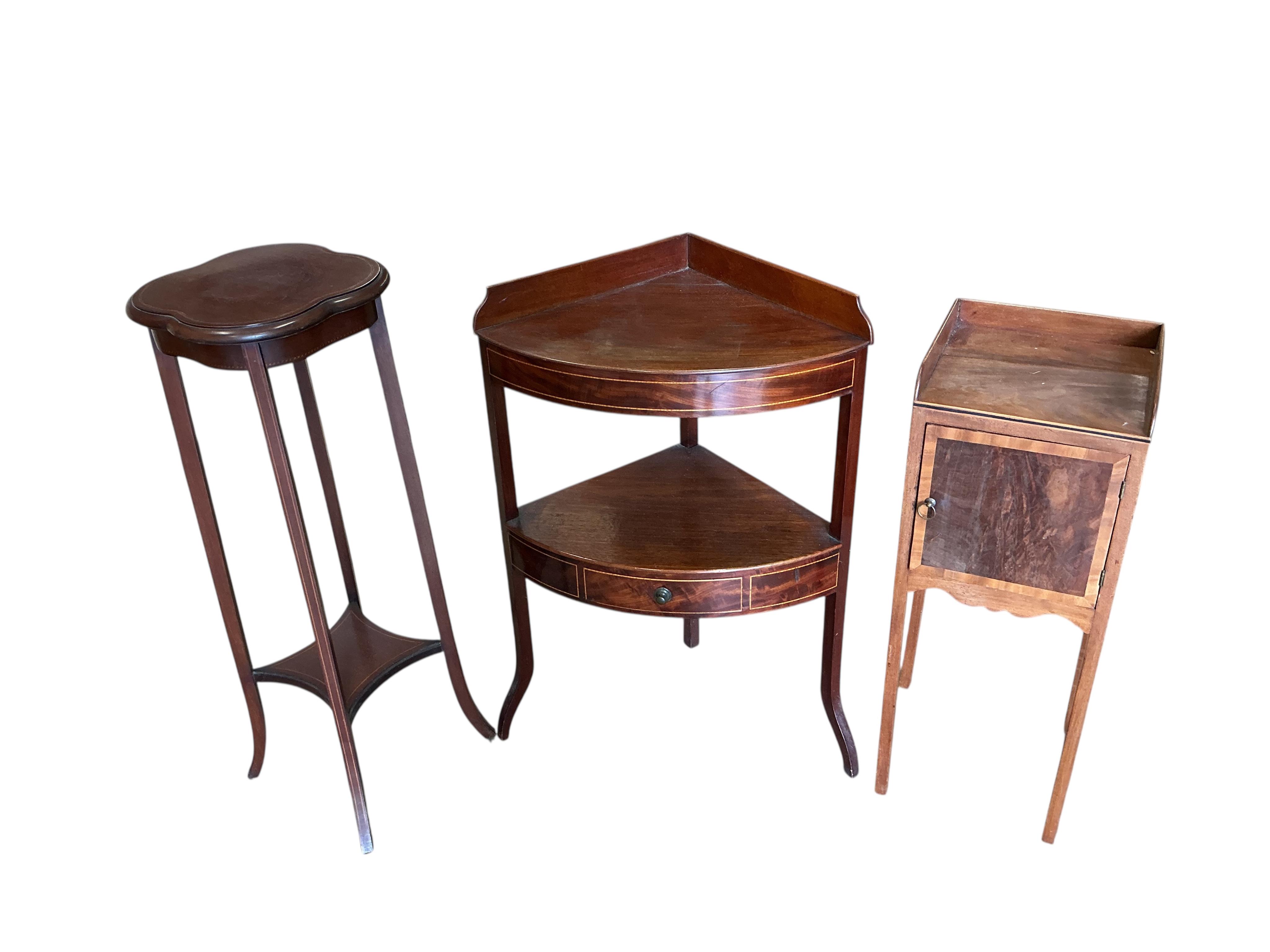 A George III mahogany bow front corner washstand, pot cupboard and an Edwardian plant stand